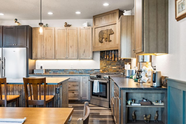 17 River Runs Ct, Plains, MT 59859 - kitchen featuring appliances with stainless steel finishes, dark wood finished floors, open shelves, tasteful backsplash, and pendant lighting