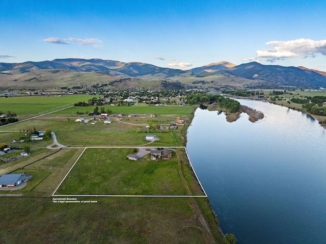 17 River Runs Ct, Plains, MT 59859 - aerial overview of property's location with a water and mountain view and property parcel outlined