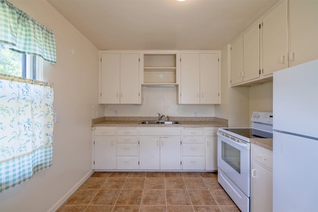 925 Hollins Ave, Helena, MT 59601 - kitchen with white appliances, a sink, light countertops, and white cabinetry