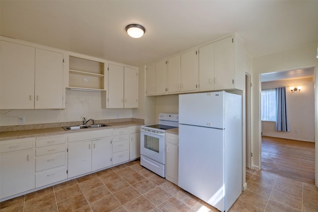 925 Hollins Ave, Helena, MT 59601 - kitchen featuring white appliances, a sink, light countertops, open shelves, and light tile patterned floors