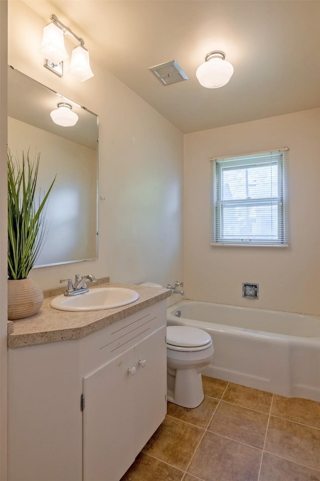 925 Hollins Ave, Helena, MT 59601 - full bath featuring a bath, vanity, toilet, and tile patterned flooring