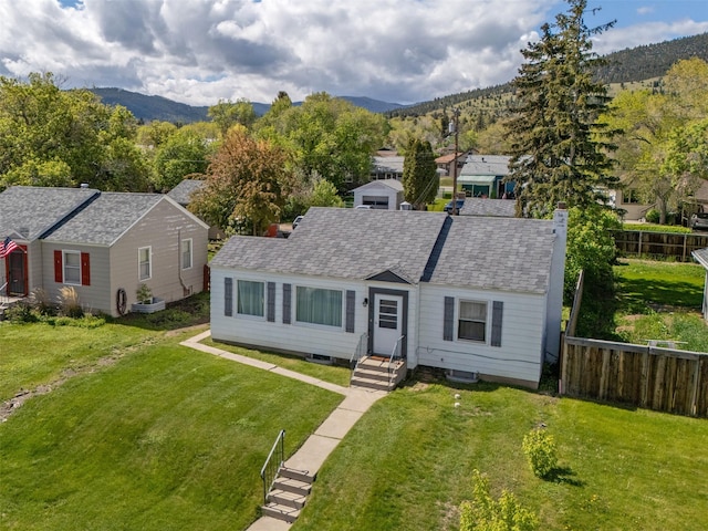 925 Hollins Ave, Helena, MT 59601 - view of front of property with a mountain view, entry steps, and roof with shingles