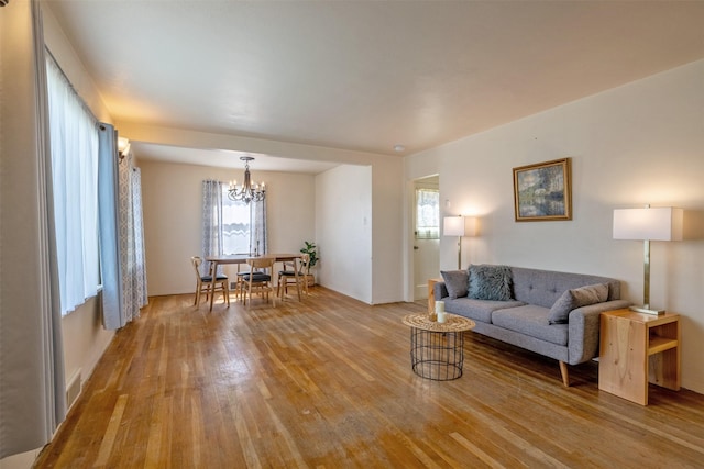 925 Hollins Ave, Helena, MT 59601 - living area featuring light wood-style floors and a chandelier