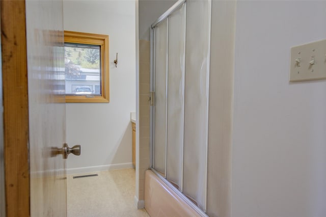 1320 Flowerree St, Helena, MT 59601 - bathroom featuring baseboards, vanity, and shower / bath combination with glass door