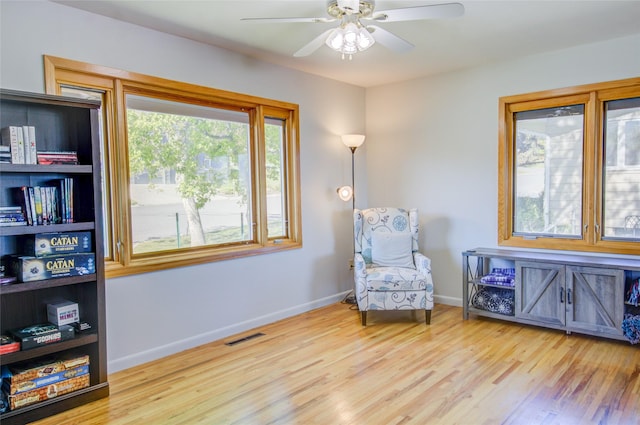 1320 Flowerree St, Helena, MT 59601 - sitting room featuring wood finished floors, baseboards, and ceiling fan