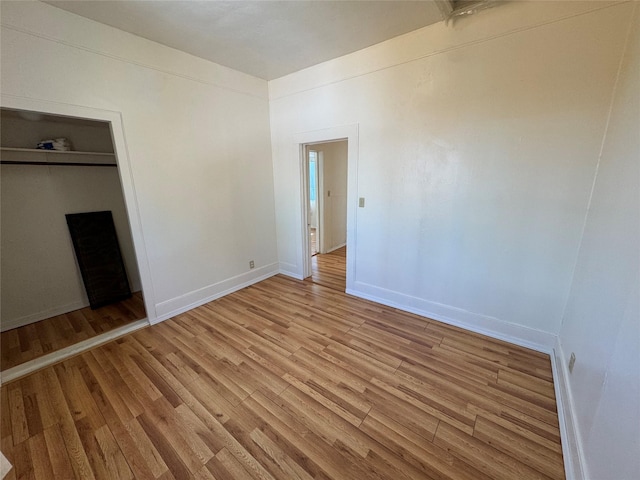 108 Meany St, Plains, MT 59859 - unfurnished bedroom featuring light wood finished floors and baseboards
