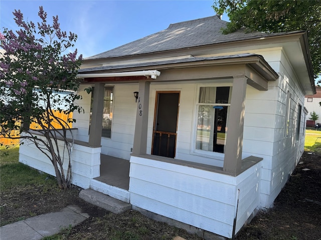 108 Meany St, Plains, MT 59859 - view of front of home featuring roof with shingles and a porch