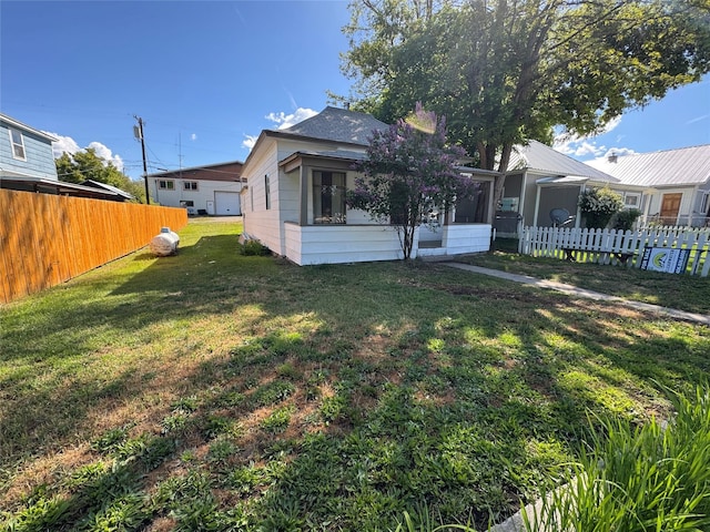 108 Meany St, Plains, MT 59859 - rear view of property with a sunroom