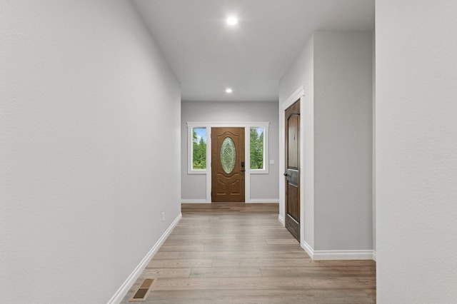 323 Skookum Rd, Lakeside, MT 59922 - entrance foyer with light wood-type flooring and recessed lighting