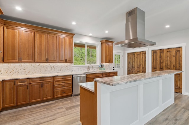 323 Skookum Rd, Lakeside, MT 59922 - kitchen featuring island range hood, dishwasher, brown cabinets, and recessed lighting