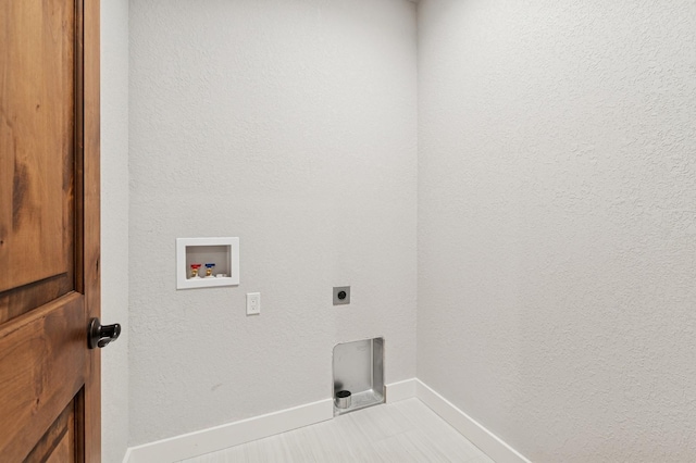 323 Skookum Rd, Lakeside, MT 59922 - washroom with electric dryer hookup, baseboards, and hookup for a washing machine