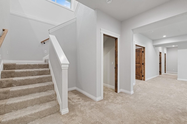 323 Skookum Rd, Lakeside, MT 59922 - stairs featuring carpet flooring and baseboards