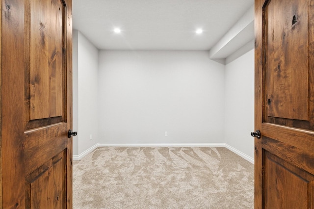 323 Skookum Rd, Lakeside, MT 59922 - unfurnished room featuring light carpet, recessed lighting, and baseboards