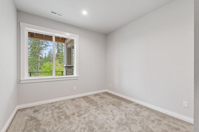 323 Skookum Rd, Lakeside, MT 59922 - carpeted empty room featuring baseboards and recessed lighting