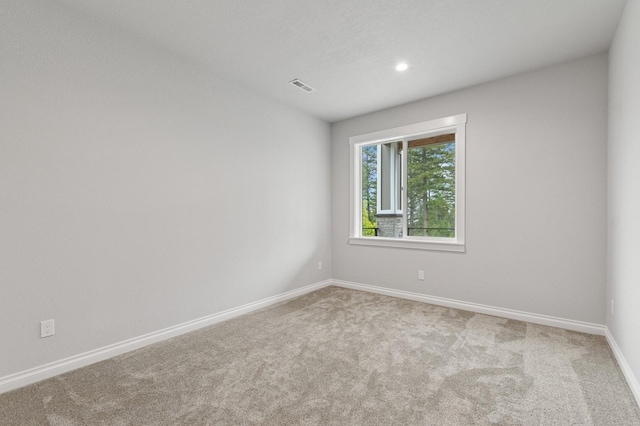 323 Skookum Rd, Lakeside, MT 59922 - carpeted spare room with baseboards and recessed lighting