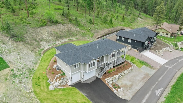 323 Skookum Rd, Lakeside, MT 59922 - view from above of property featuring a heavily wooded area