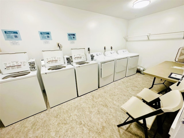 951 Ronald Ave Unit 410, Missoula, MT 59801 - communal laundry room with washer and clothes dryer
