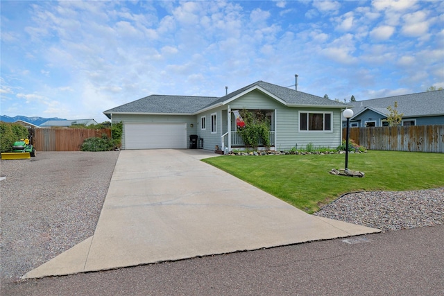 158 Parkside Dr, Kalispell, MT 59901 - ranch-style house with concrete driveway and an attached garage