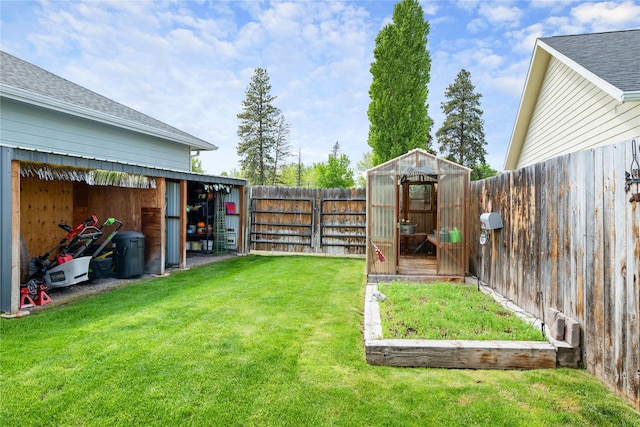 158 Parkside Dr, Kalispell, MT 59901 - view of yard featuring an outdoor structure and an exterior structure