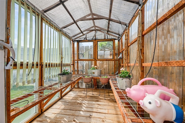 158 Parkside Dr, Kalispell, MT 59901 - sunroom / solarium featuring wood-type flooring, lofted ceiling, and wooden walls