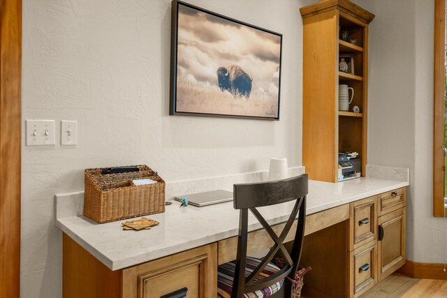 36665 Highland Ct, Polson, MT 59860 - home office with built in study area and light wood-type flooring