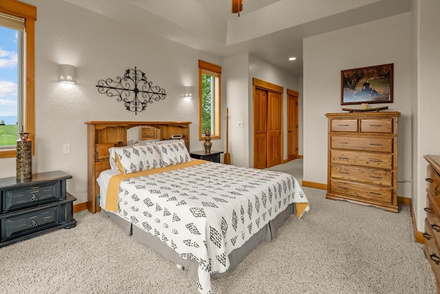 36665 Highland Ct, Polson, MT 59860 - bedroom with carpet flooring, multiple windows, baseboards, and recessed lighting