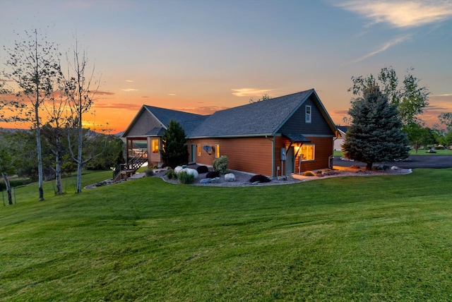 36665 Highland Ct, Polson, MT 59860 - view of front of home with a yard