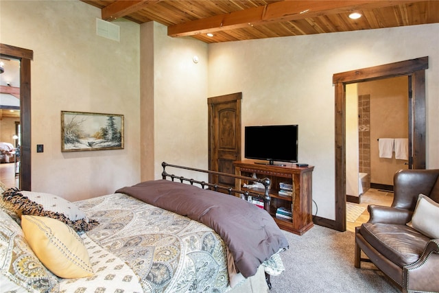 380 Haskill Basin Rd, Whitefish, MT 59937 - carpeted bedroom with a wooden ceiling with exposed beams