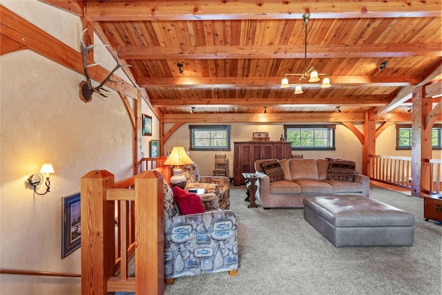 380 Haskill Basin Rd, Whitefish, MT 59937 - carpeted living area with a wooden ceiling with exposed beams