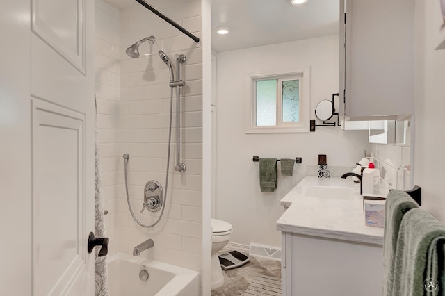 1502 Hauser Blvd, Helena, MT 59601 - full bathroom with vanity, toilet, shower / bathtub combination, baseboards, and recessed lighting
