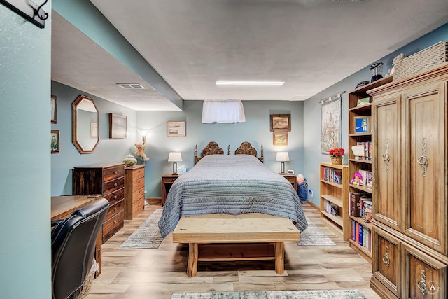 1502 Hauser Blvd, Helena, MT 59601 - bedroom featuring light wood-type flooring and baseboards