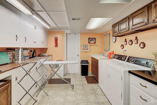 1502 Hauser Blvd, Helena, MT 59601 - laundry area featuring cabinet space and washer and dryer