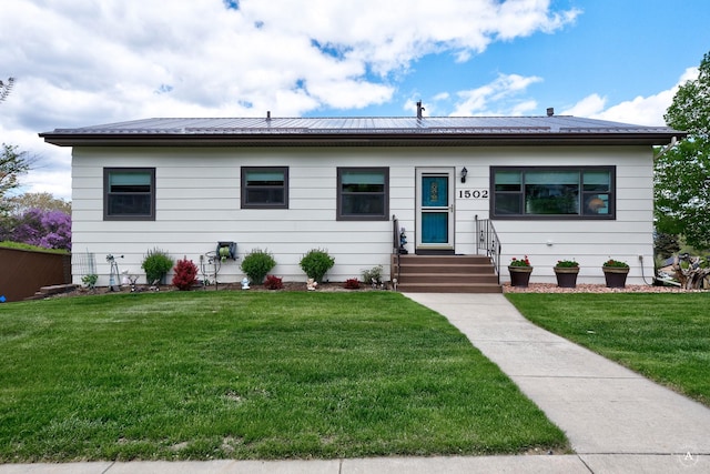 1502 Hauser Blvd, Helena, MT 59601 - bungalow-style home with a front yard, a metal roof, and entry steps