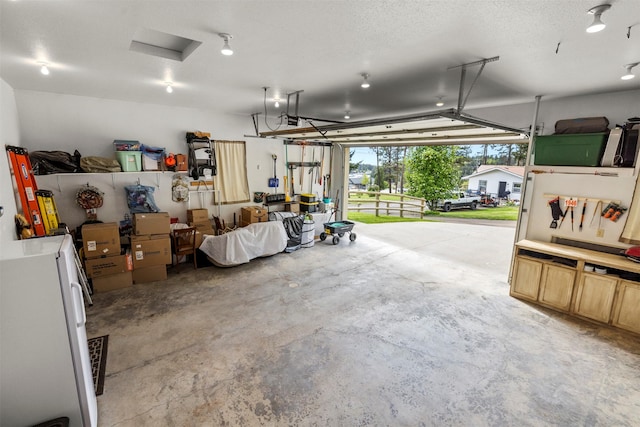 100 Rimini Rd, Lakeside, MT 59922 - garage featuring freestanding refrigerator