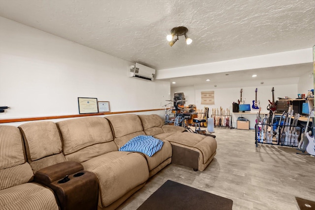 1509 Eagle Dr, Kalispell, MT 59901 - living room featuring a wall unit AC, a textured ceiling, light wood-style floors, and recessed lighting