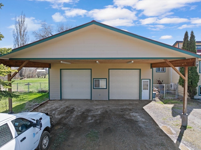 1509 Eagle Dr, Kalispell, MT 59901 - garage featuring a detached garage and a gate