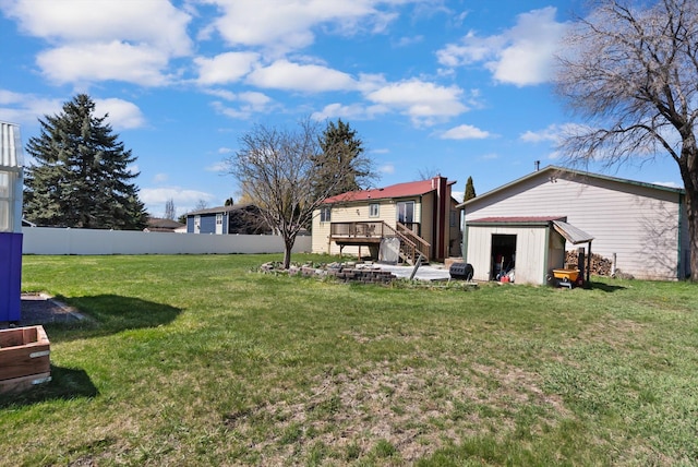 1509 Eagle Dr, Kalispell, MT 59901 - view of yard with stairs and a wooden deck