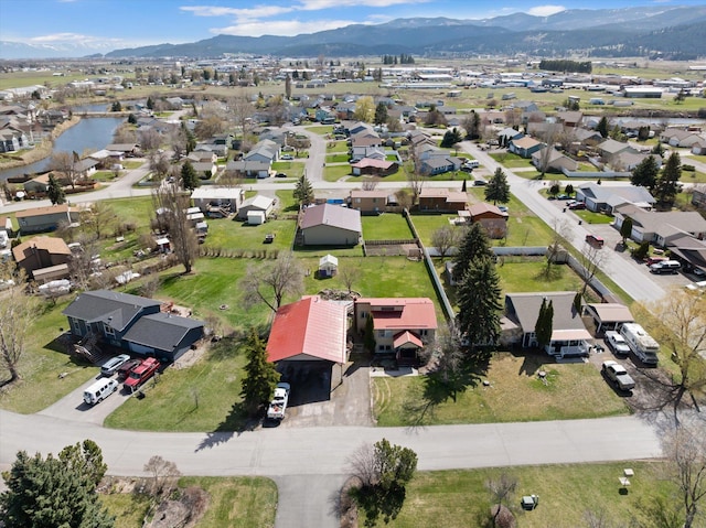 1509 Eagle Dr, Kalispell, MT 59901 - aerial view of property and surrounding area with nearby suburban area and a water and mountain view