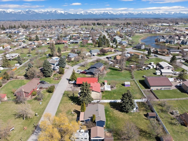 1509 Eagle Dr, Kalispell, MT 59901 - aerial overview of property's location with nearby suburban area and a water and mountain view