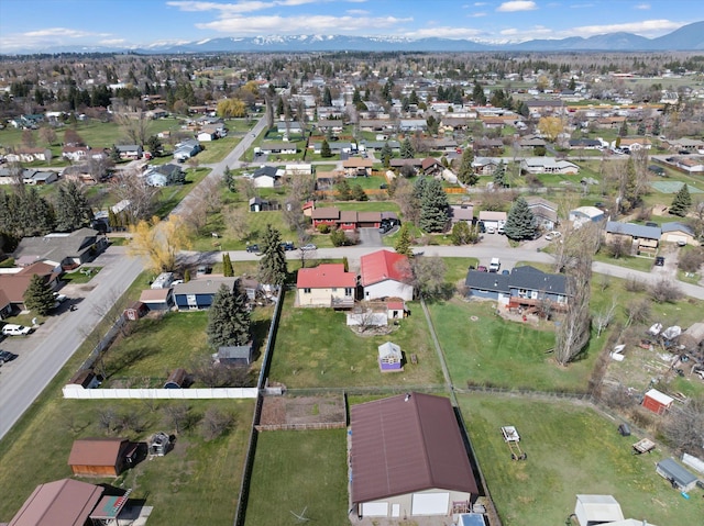 1509 Eagle Dr, Kalispell, MT 59901 - aerial view of property and surrounding area with a mountainous background and nearby suburban area