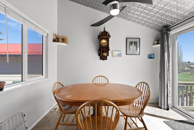 1509 Eagle Dr, Kalispell, MT 59901 - dining area with baseboards, wood finished floors, ceiling fan, and vaulted ceiling