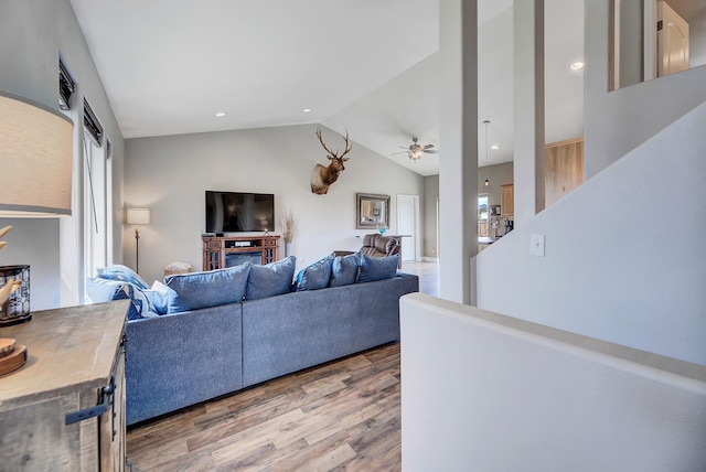 1150 Vega Rd, Helena, MT 59602 - living area with wood finished floors, vaulted ceiling, ceiling fan, and recessed lighting