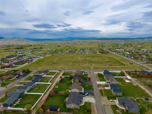 1150 Vega Rd, Helena, MT 59602 - aerial overview of property's location with mountains and nearby suburban area
