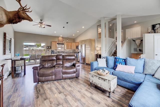1150 Vega Rd, Helena, MT 59602 - living area featuring a ceiling fan, lofted ceiling, wood finished floors, recessed lighting, and stairway