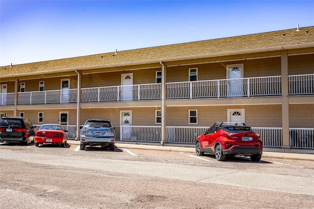 1 Kootenai Ave Unit 17, Polson, MT 59860 - view of building exterior with uncovered parking