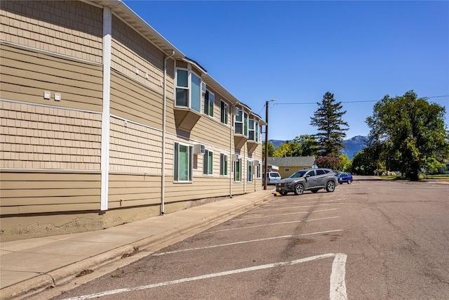 1 Kootenai Ave Unit 17, Polson, MT 59860 - view of asphalt street with curbs, sidewalks, and a mountain view