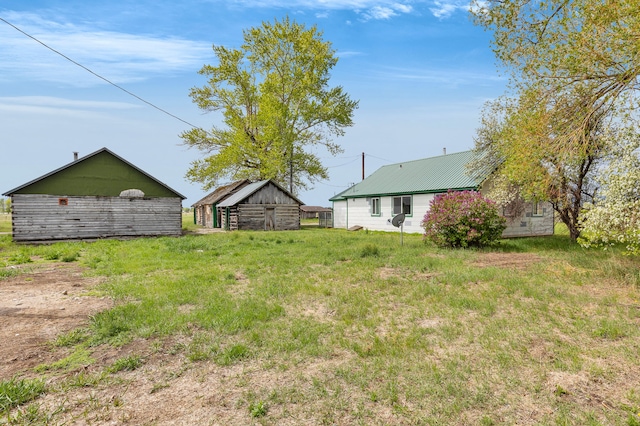1680 W River Rd, Deer Lodge, MT 59722 - view of yard with an outdoor structure