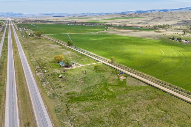 1680 W River Rd, Deer Lodge, MT 59722 - aerial view of property and surrounding area with mountains and rural landscape