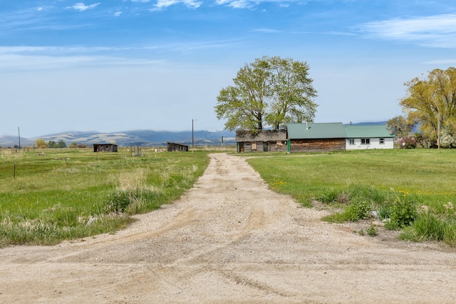 1680 W River Rd, Deer Lodge, MT 59722 - view of front facade with a rural view and driveway