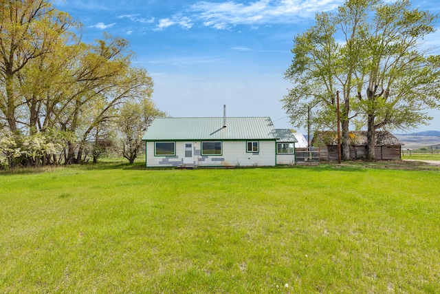 1680 W River Rd, Deer Lodge, MT 59722 - back of house featuring a metal roof